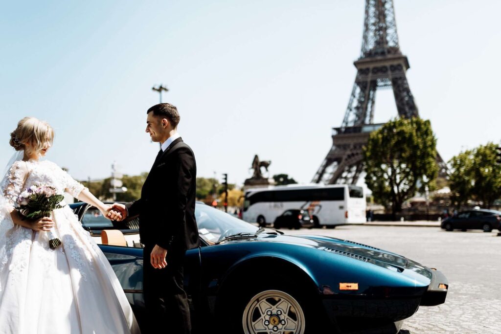 bride stepping into a black luxury sedan after the ceremony
